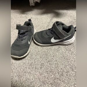 Kids Nike grey shoes